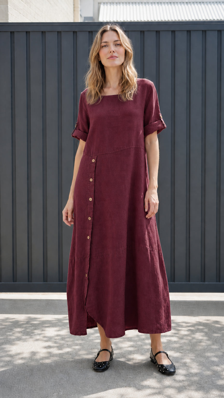 Front view of burgundy asymmetrical button-front maxi dress