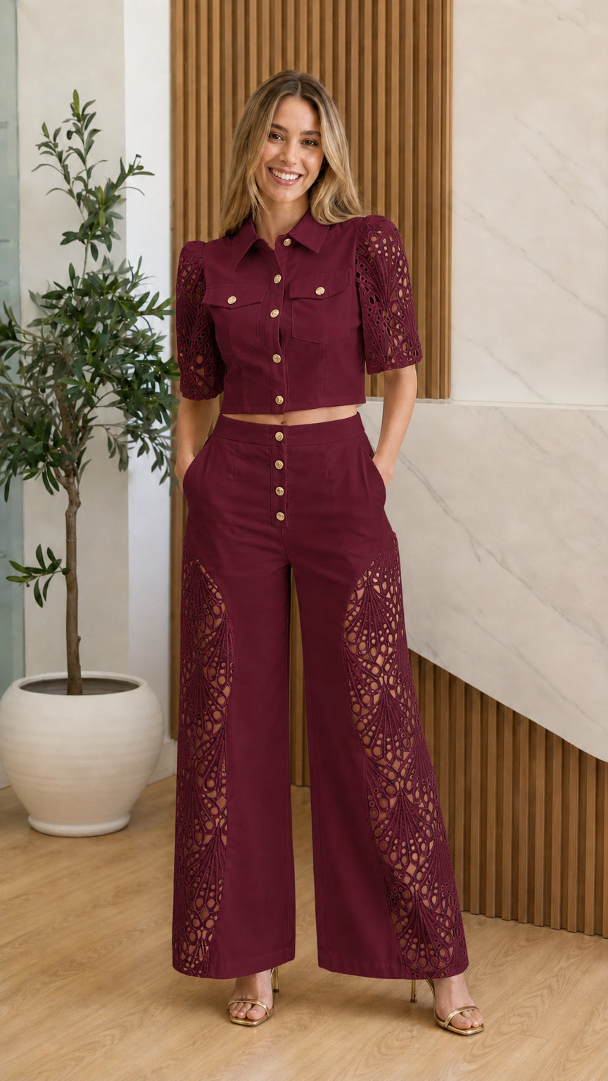 Model wearing burgundy eyelet crochet two-piece set
