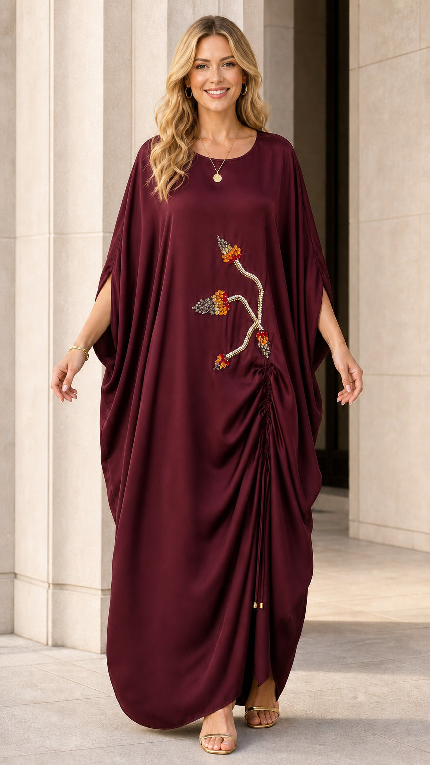 Model wearing burgundy kaftan maxi dress