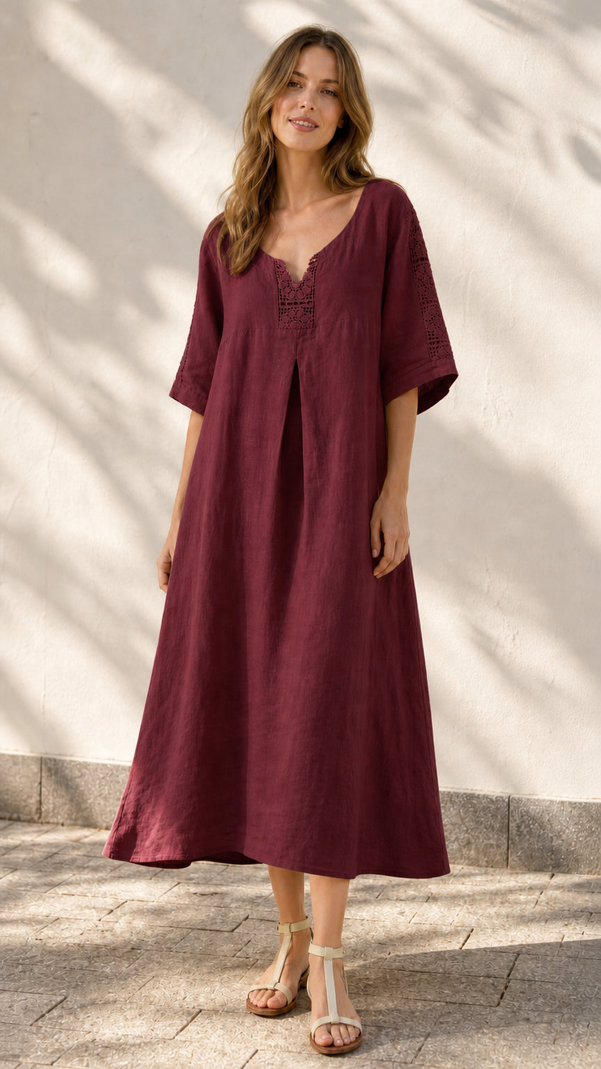 Front view of model wearing burgundy midi dress