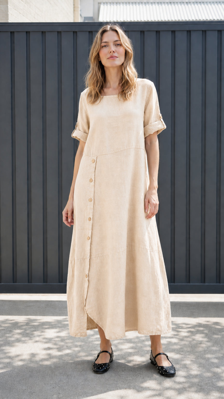 Front view of beige asymmetrical button-front maxi dress