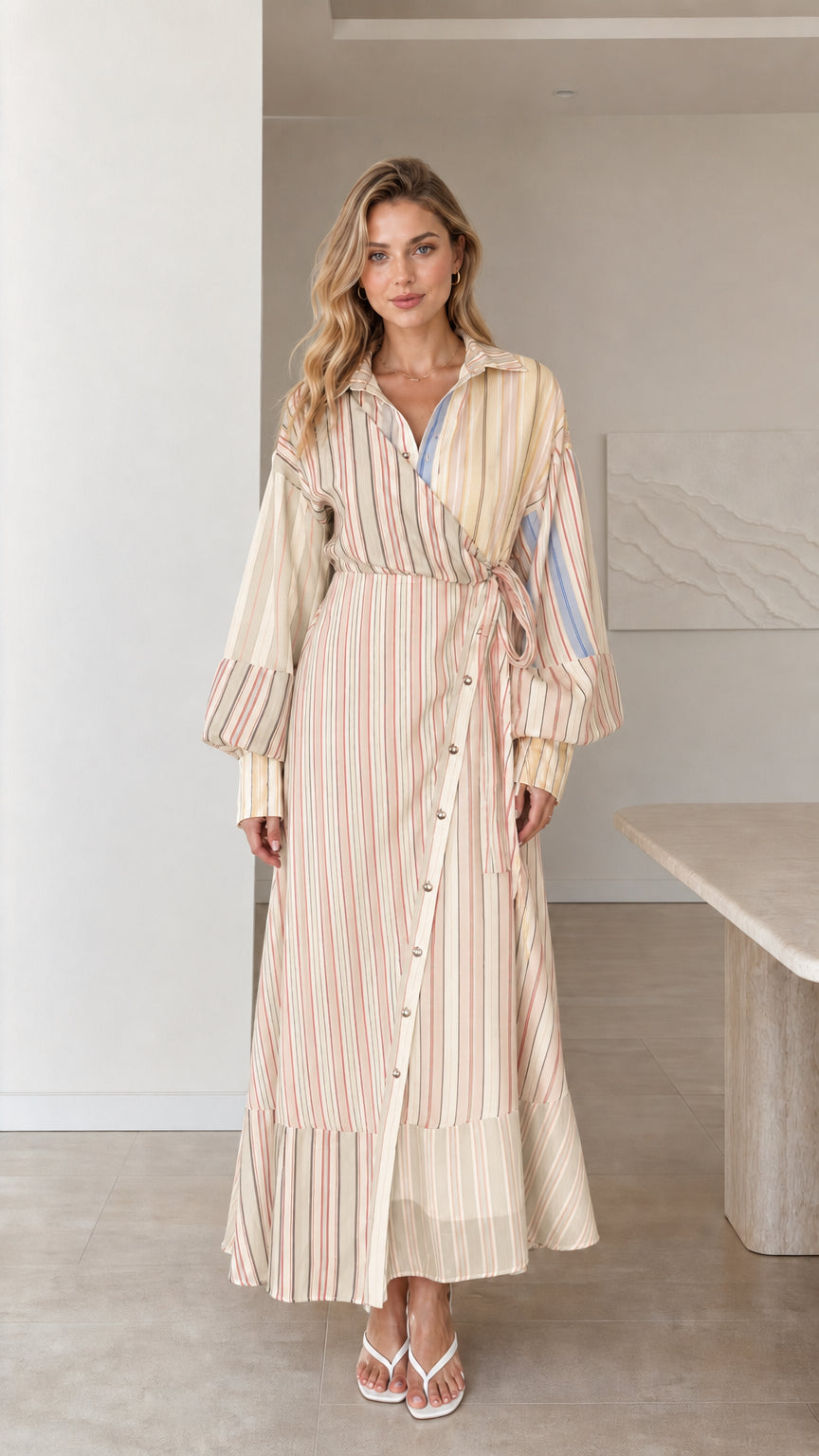 Model wearing beige striped wrap maxi dress