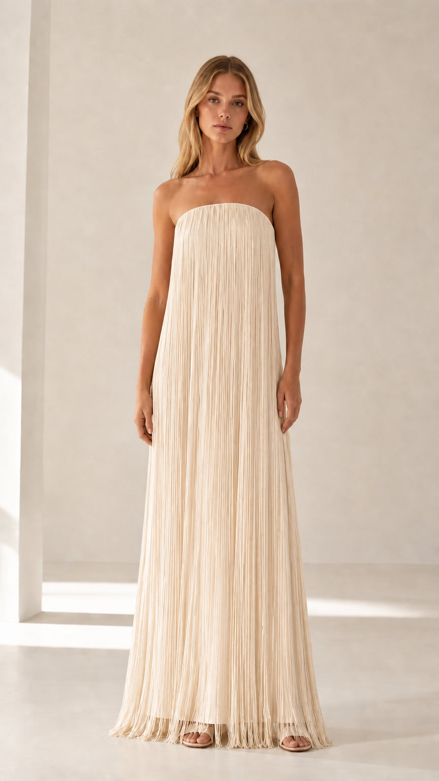 Model wearing cream strapless pleated maxi dress