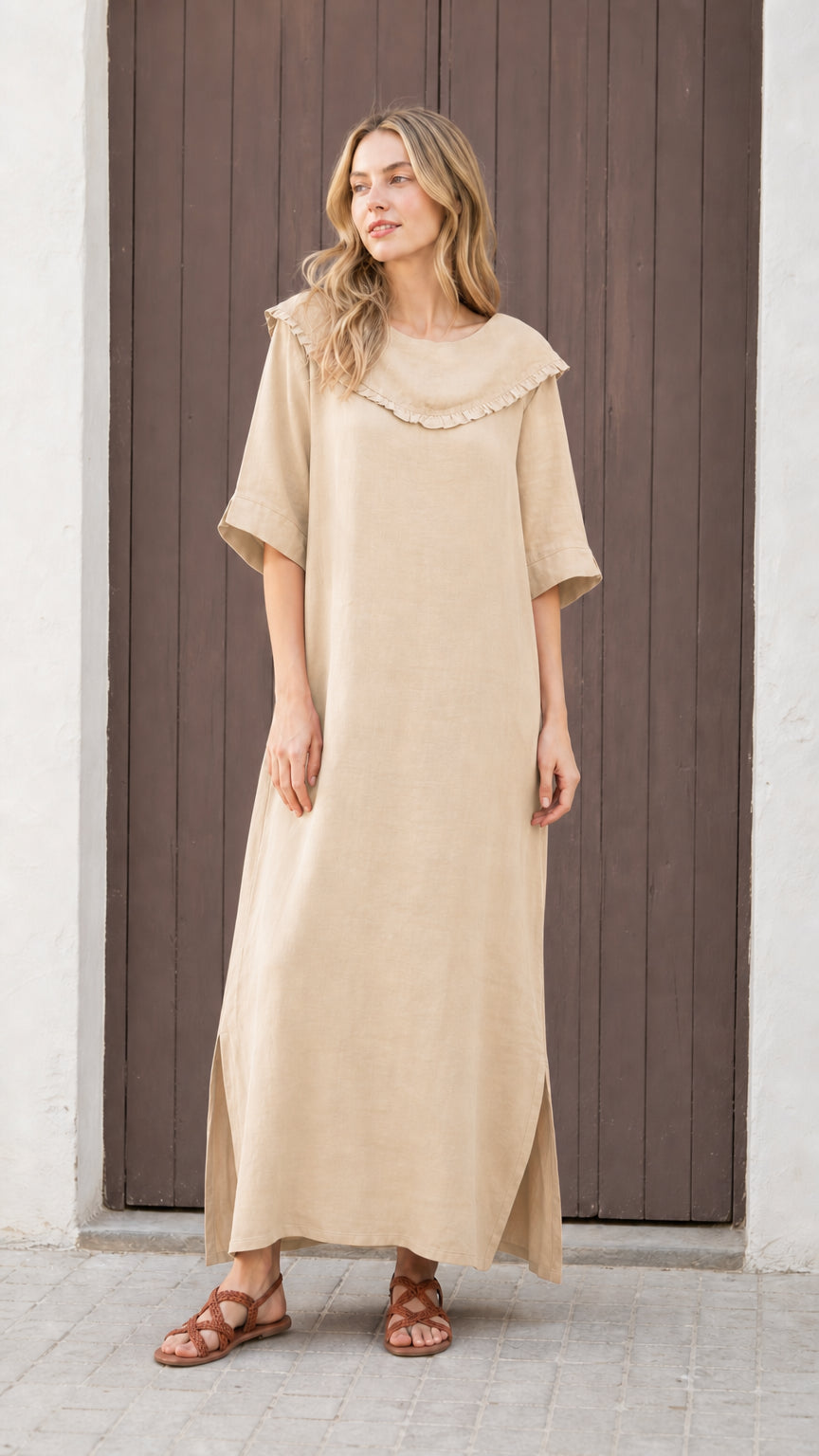 Front view of woman wearing khaki relaxed-fit maxi dress