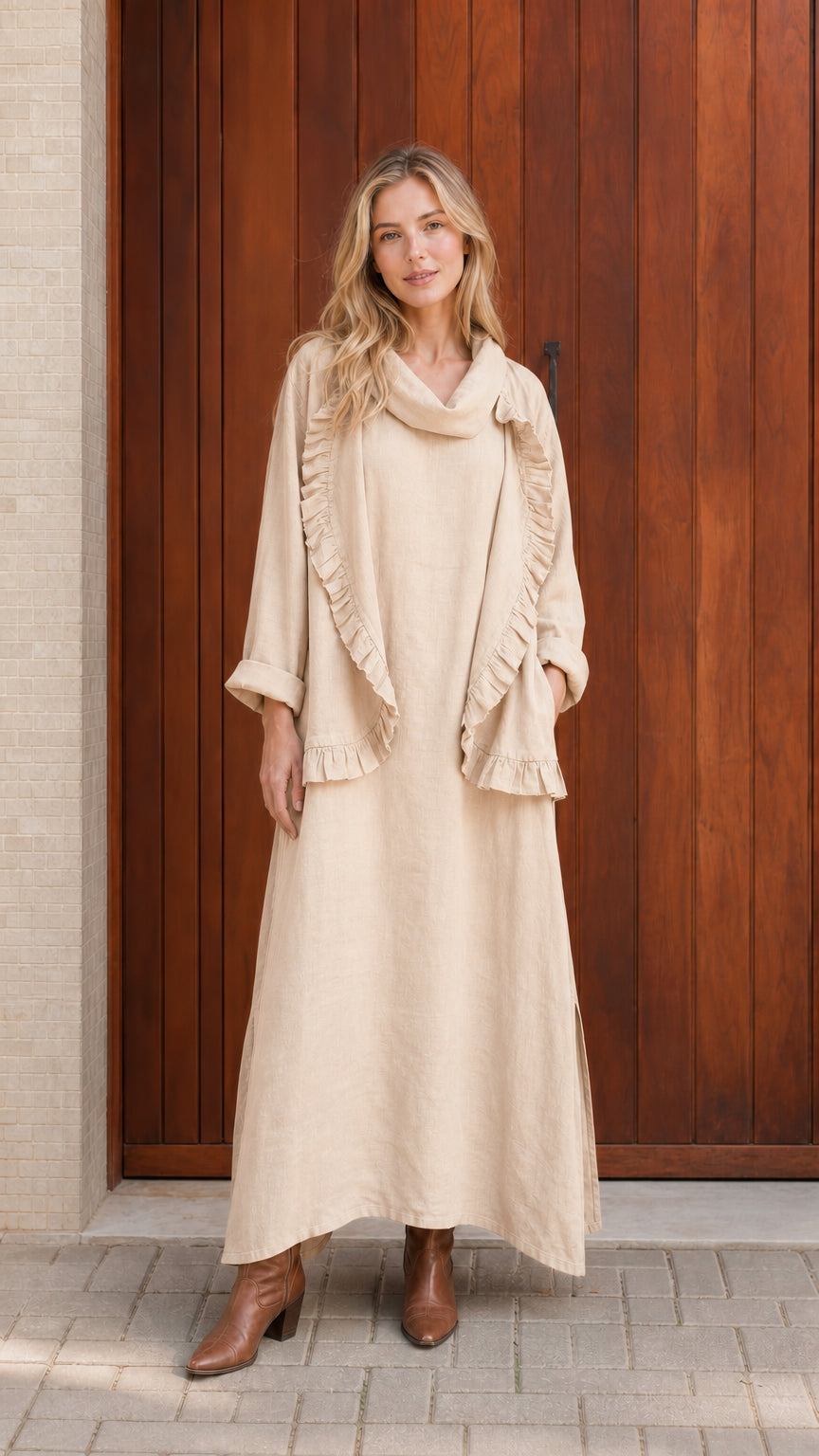 Model wearing beige ruffled cowl neck top and maxi skirt set